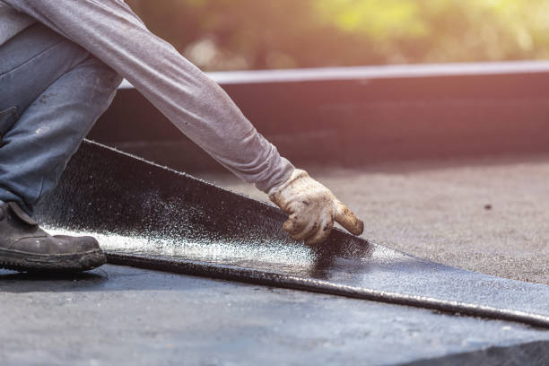 Professional Basement Waterproofing technician working in Spring Hill, KS